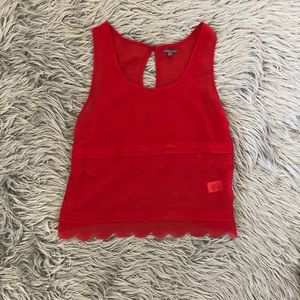 Scalloped red tank